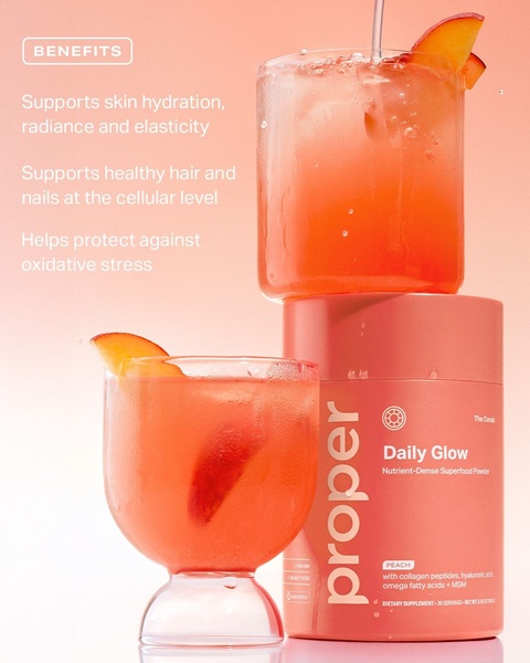 A 4:5 vertical ad featuring a tub of Daily Glow superfood powder next to glasses of peach-colored drink, using a soft, warm aesthetic to highlight product benefits.